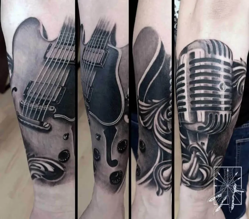 Realistyczna gitara wytatuowana na ręce